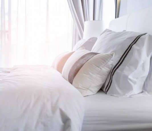 How to Clean Your Pillows! clean pillows on bed