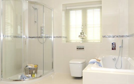 How to Clean Bathroom Tiles, Soap Scum, and Bathroom Grout a white bathroom