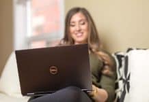 Digital Clutter: 6 Tips to Manage Too Many Emails Melissa Maker with laptop