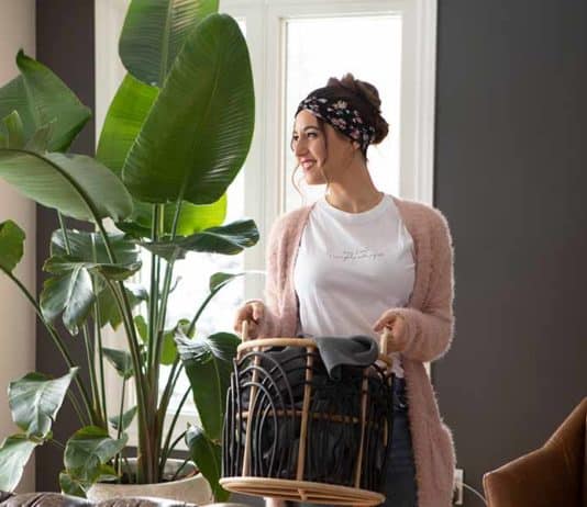 How To Get The Smell Out Of Workout Clothes: 7 Hacks Melissa with laundry basket