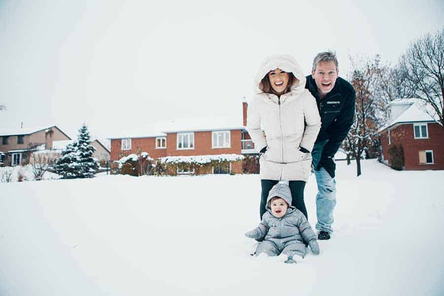 Melissa Maker with her family in the snow