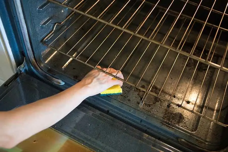 Scrubbing the oven
