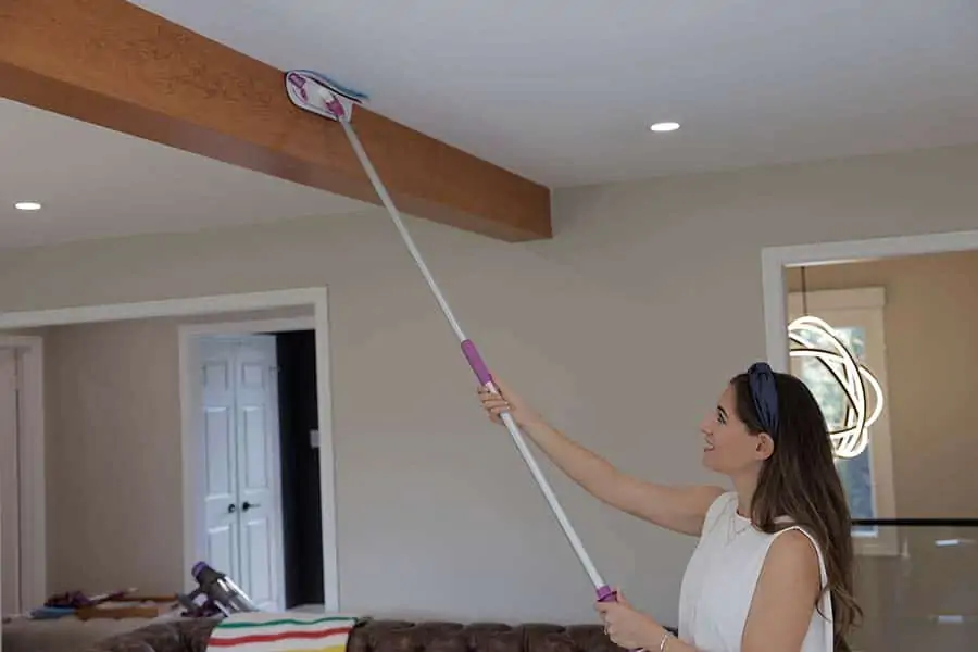 Melissa Maker using the Maker's Mop on her ceiling