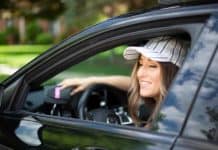 The Busy Parent’s Car Cleaning Tips: DIY Car Cleaner Melissa wearing a baseball cap in her car