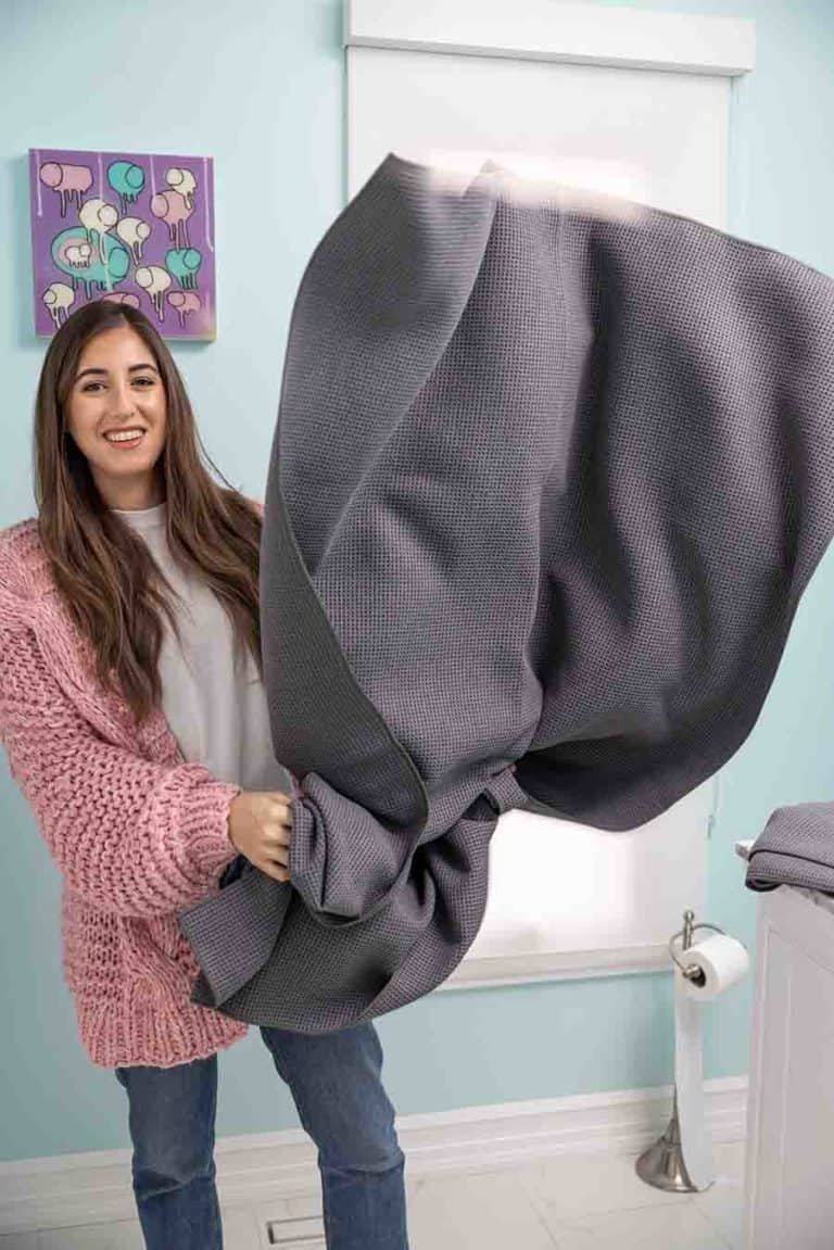Melissa holding a large towel