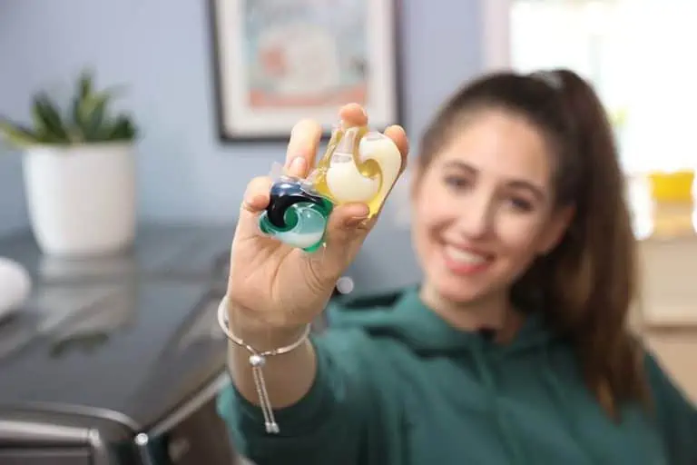 Melissa Maker holding a laundry pac