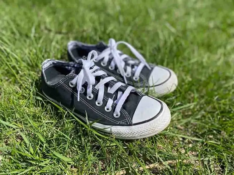 Black converse in the grass
