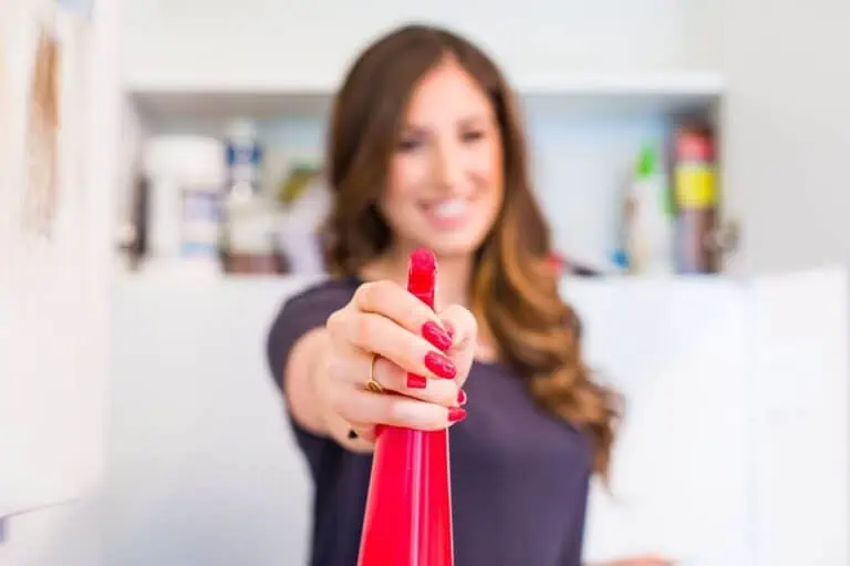 Melissa with a spray bottle