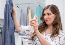 7 Clever Cleaning Tools to Help You Clean Smarter! melissa maker spraying a shirt
